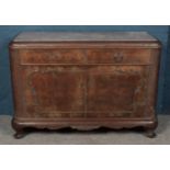 A carved walnut sideboard with marble top. (85cm x 123cm x 46cm)