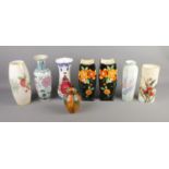 A quantity of decorative floral vases including Falcon Ware pair, Saxony, etc. Approx. 8 pieces.