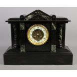 A black slate and marble mantle clock, with Arabic numeral dial. 31cm high.