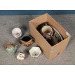 A box of oriental ceramics including plates, teapot, saucers and jugs.