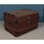 A vintage tin trunk.