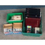 A box of stamps including first day covers and loose examples. Also includes several incomplete