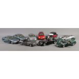 Nine larger scale model vehicles, all produced by Maisto. To include Jaguar S-Type, Aston Martin DB7