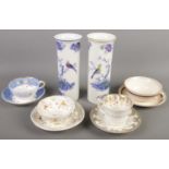 Four cups & saucers along with a pair of Wood & Sons vases. Includes Rockingham examples baring puce