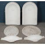 A pair of plaster cast alcoves along with two plaster cast ceiling roses and pair of shelves.