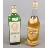 A full & sealed bottle of John Power & Son Irish whiskey along with a Furst Bismarck bottle of