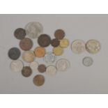 A quantity of mostly British pre-decimal coins to include 1942 and 1949 half crowns, Winston