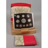 A Golden Jubilee 2003 Executive proof set in case. Lid hinge is broken.