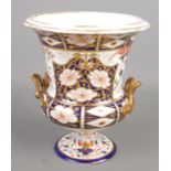 A 19th century Royal Crown Derby twin handled vase. Imari design. (21cm)