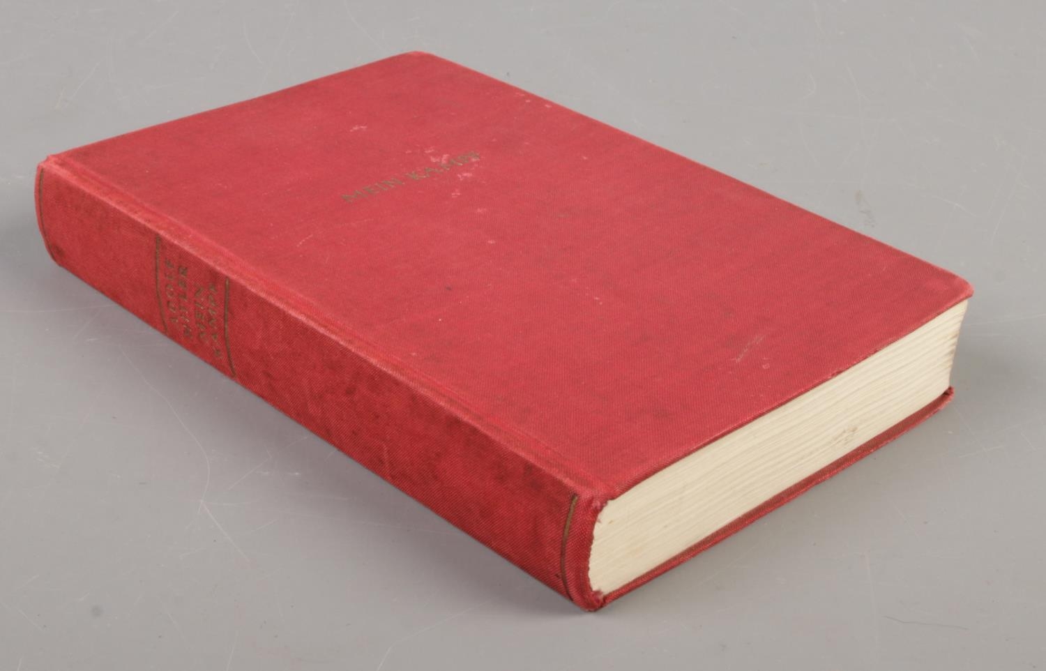 A 1940 German transcript edition of Mein Kampf with red cloth covers and inside cover with printed