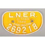 A cast iron LNER Darlington sign. 1944, 21 tons; 269218. Height: 16cm, Width: 28cm. Has been