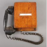 A railway signal box telephone with receiver; for 'Dirt Disposal, G.F.Tele'. Label on inside for