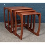 A nest of three Sunelm teak tables. Cup mark to top example.