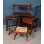 Four pieces of occasional furniture. Includes teak tea trolley, tile top table, nest of two tables