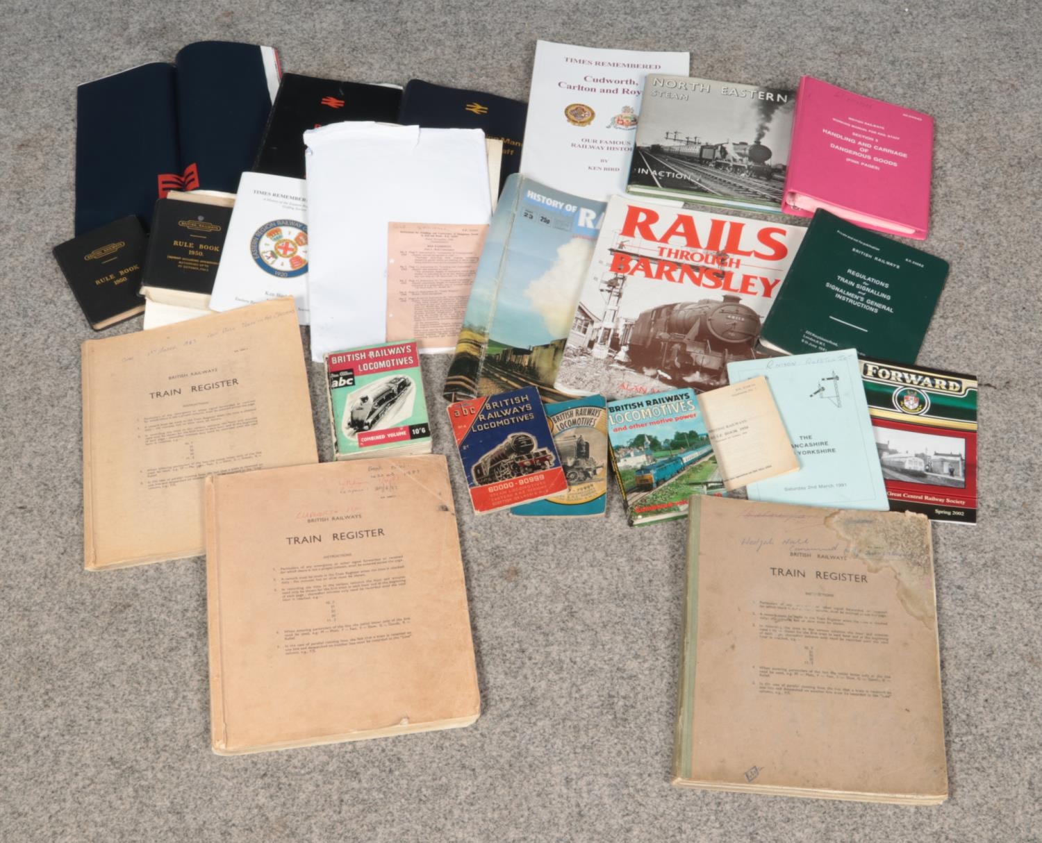 A collection of railway books and magazines, to include. Train Register, 1950 rule book and