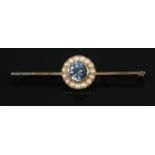 A 9ct Gold, blue gemstone and pearl brooch. Total weight: 5.9g.