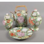 Four vintage pieces of Chinese ceramics. Includes lidded vases, dish and teapot.