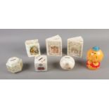 A quantity of ceramic money boxes including Brambly Hedge, Wedgwood Peter Rabbit, Royal Albert