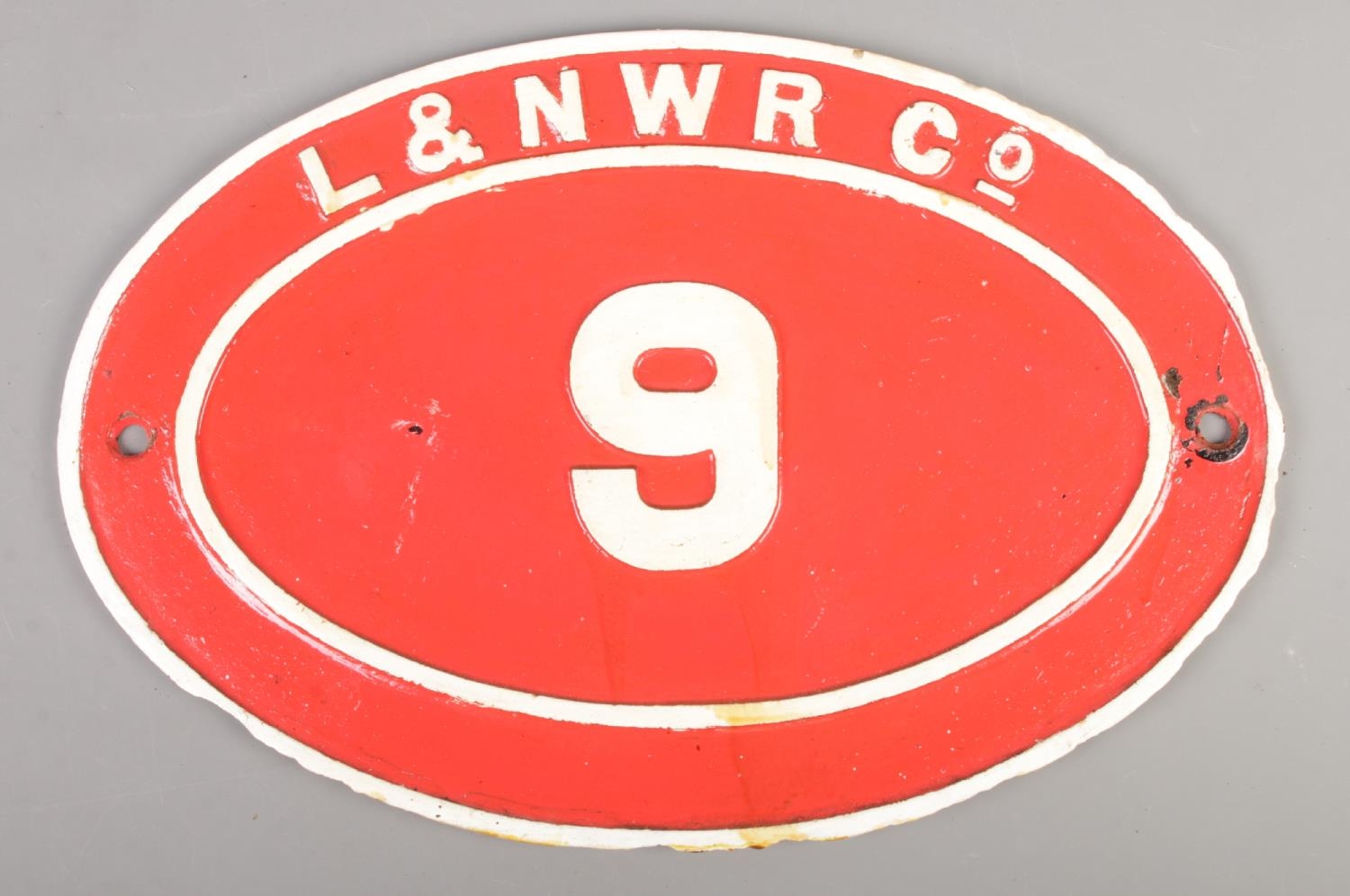 A cast iron London and North Western Railway bridge plate, No. 9. Height: 30cm, Width: 45cm. Has