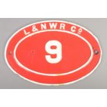 A cast iron London and North Western Railway bridge plate, No. 9. Height: 30cm, Width: 45cm. Has