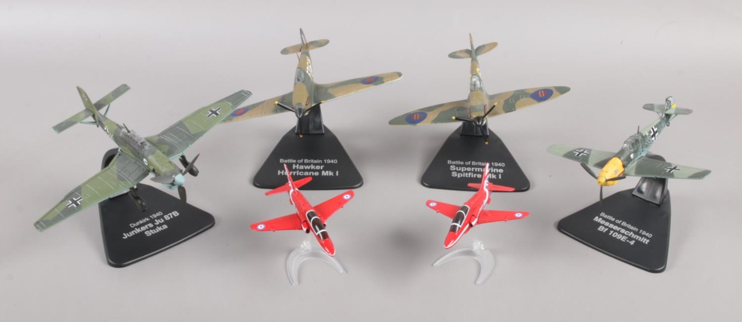 A collection of diecast aeroplanes on stands. Four Atlas Edition Battle of Britain and Dunkirk