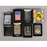 Six boxed vintage Zippo lighters, some used including Jack Daniels, Australian Kangaroo Road Sign,