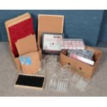 Two boxes of shop/fair display accessories. Includes jewellery pads, cases with dividers, cork