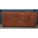 A teak sideboard. (180cm x 85cm x 53cm) Water damage, one door locked shut.