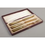 A cased set of WWI trench art cutlery, from the training camp of Etaples, Northern France.