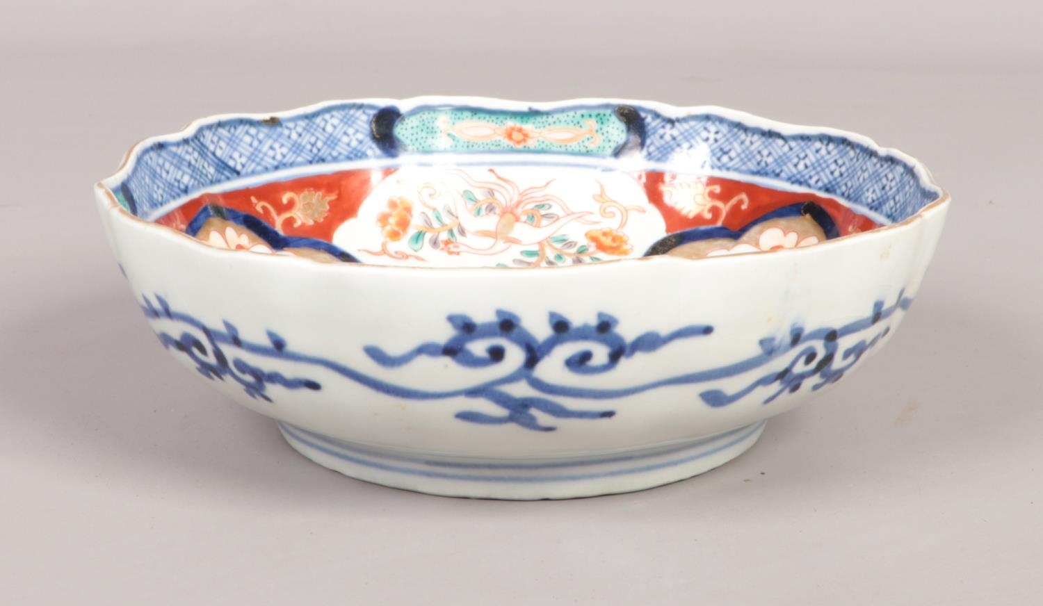 A 19th Century Japanese Imari bowl bearing Fuki Chosun character marks to the base. Diameter 18cm.