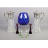 A good collection of glassware. To include a large pair of silver plated claret jugs, cobalt blue