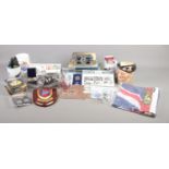 A good collection of RAF, Royal Navy and WWI collectables and souvenirs. To include Royal Doulton '