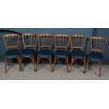 A set of six gilt wood upholstered function chairs. A some of the chairs have splits to the wood.