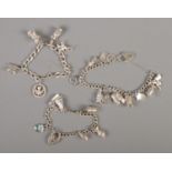 Three silver charm bracelets with mostly silver charms. 88g.