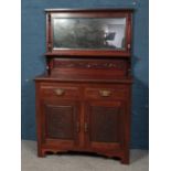 A Victorian carved mahogany mirror back sideboard.