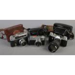 Three cameras. Including Pentacon FM, Fed 4 and Agfa Isoly 100. All with cases.