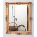 A gilt framed rectangular mirror. Height: 47cm Width: 38cm.