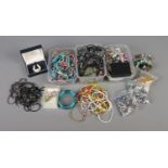 Three trays of assorted costume jewellery to include necklaces, bracelets, Royal Doulton brooch
