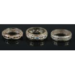 Three eternity rings. Including 9ct gold & silver example, etc.