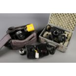Two cases of photographic equipment. Includes Zenit TTl camera body, lenses etc.