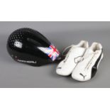 A Garneau P.06 cycling helmet along with pair of Puma Ferrari trainers (Size 10 UK).