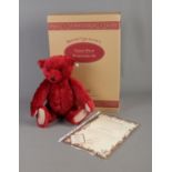A boxed Steiff Burgundy 40 jointed bear with growler. No. 00398. Complete with original