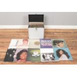 A hard record case containing a collection of mainly rock and pop records. To include T-Rex,