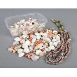 A large quantity of shell jewellery, mainly earrings.