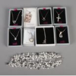 Eight silver necklaces and one silver clasped necklace including cross and Forever Friends examples.
