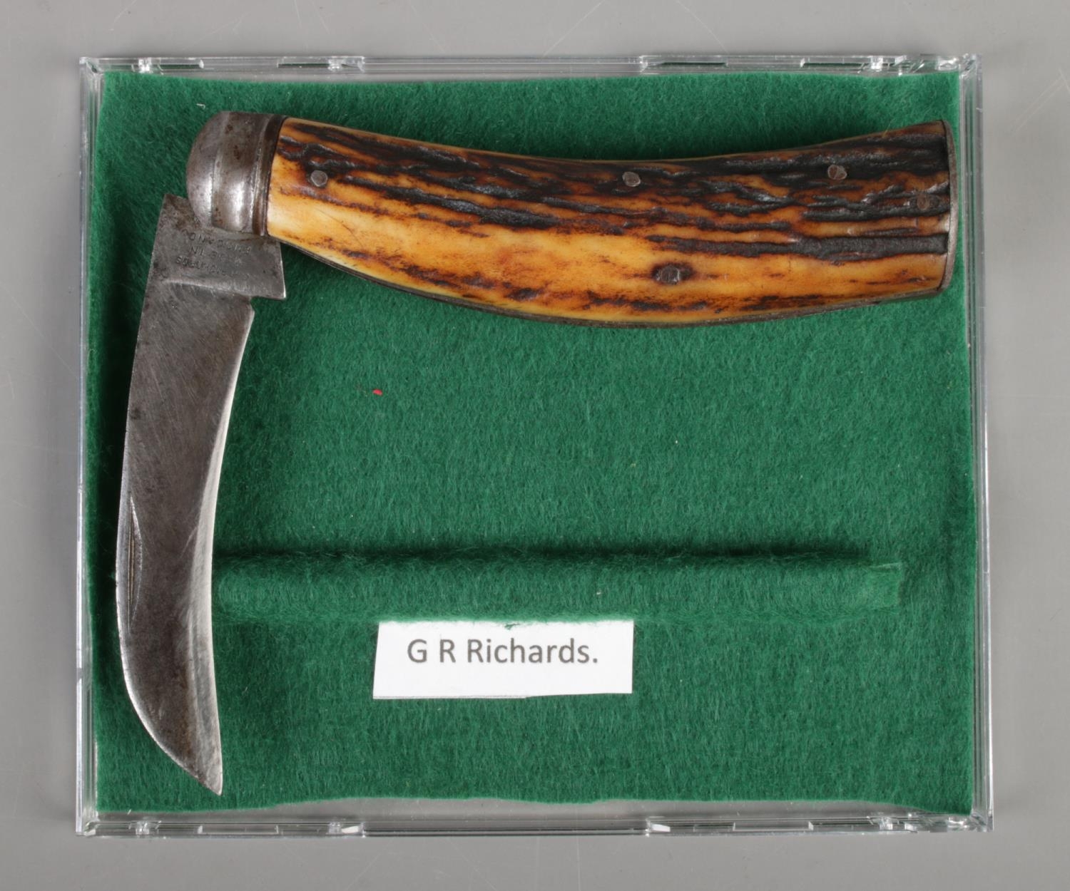 A Sheffield made folding knife with antler handle, by G.H Richards.