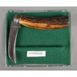 A Sheffield made folding knife with antler handle, by G.H Richards.