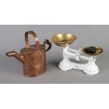 A set of Librasco kitchen scales with weights along with copper watering can.
