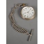 A silver cased John Walker of London pocket watch, on silver double albert chain. Case of watch