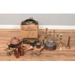 A good collection of metalwares, to include a quantity of brass candlesticks, copper measuring jugs,
